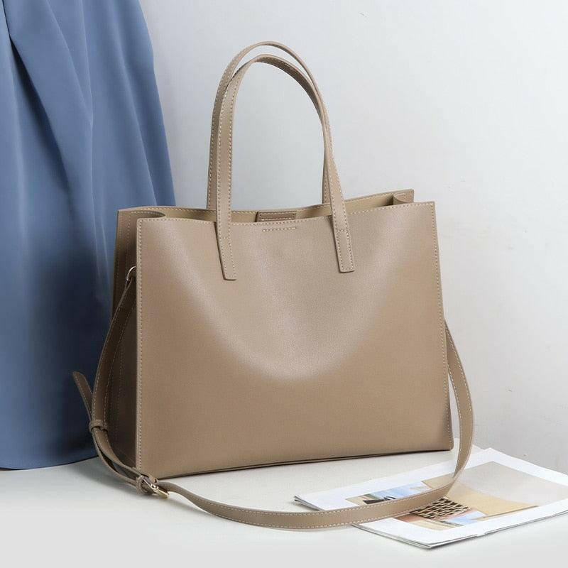 Classic Leather Handbag with Timeless Design and Spacious Interior Taupe